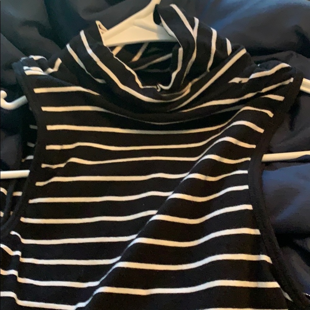 A turtle neck crop top. Black and white stripe